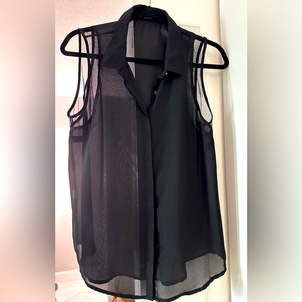 New. Sophisticated Black sleeveless button down collared shirt For office or fun